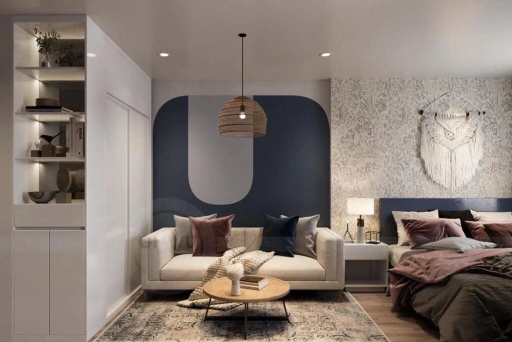 Modern 28–30m² studio apartment at RiverGate Residence with full furnishings, sofa, bed, and stylish decor